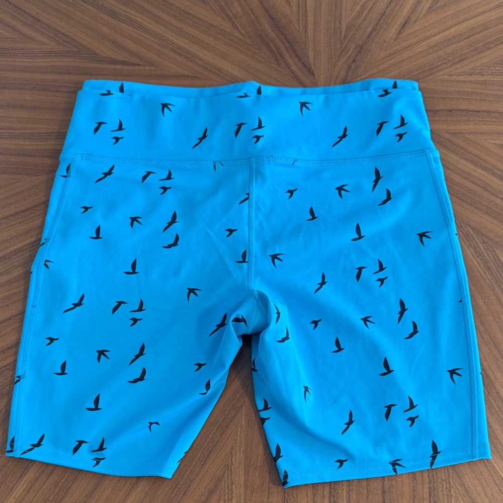 Oiselle Teal Shorts with Black Bird Design